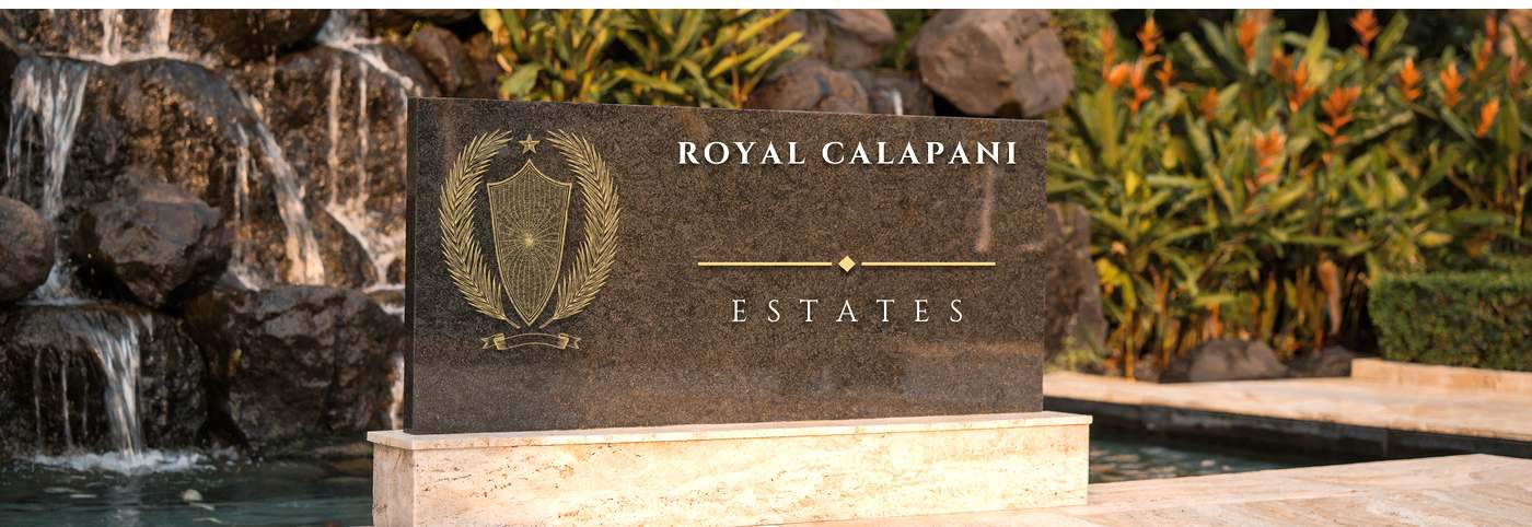 Artist's impression of the name stone: the crest and the words
                    Royal Calapani Estates engraved on dark stone.