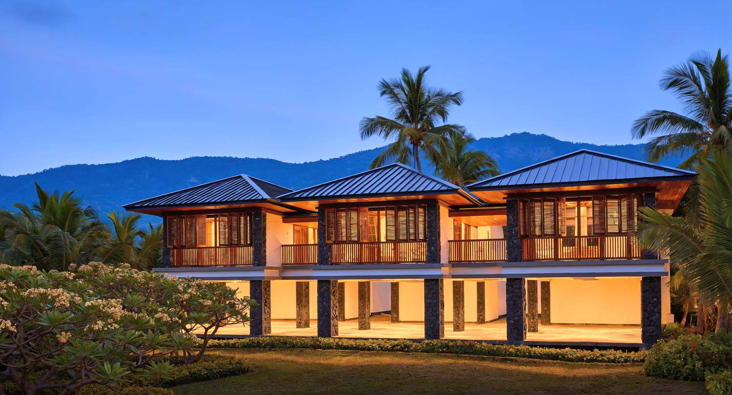 Artist's impression of the resort at dusk, all three pavilions lit from
                    within.
